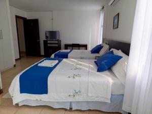 Postel nebo postele na pokoji v ubytování Hotel Yurak