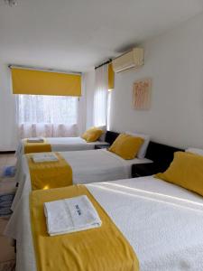 Postel nebo postele na pokoji v ubytování Hotel Yurak