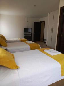 Postel nebo postele na pokoji v ubytování Hotel Yurak