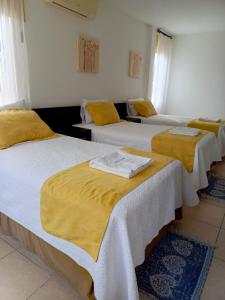 Postel nebo postele na pokoji v ubytování Hotel Yurak