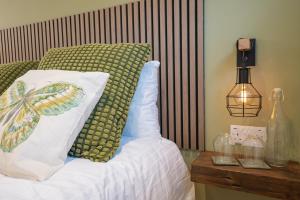 Voodi või voodid majutusasutuse The Links Suites toas