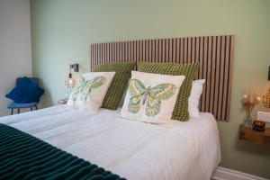 Voodi või voodid majutusasutuse The Links Suites toas