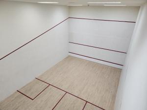 an empty gymnasium with a basketball court at Downtown Oasis, Burj Khalifa Views, Luxury Amenities in Dubai