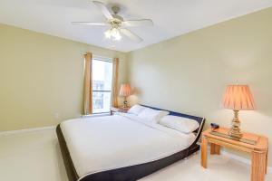 a bedroom with a bed and a ceiling fan at Houston Vacation Rental about 1 Mi to NRG Stadium! in Houston