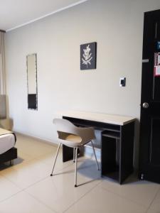 Posezení v ubytování Hotel Suite Center Pereira
