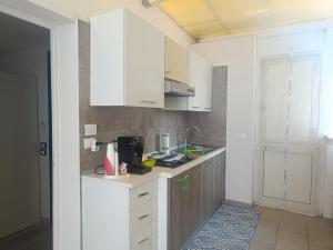 Kuchyň nebo kuchyňský kout v ubytování DiVino Appartamenti Vista Mare
