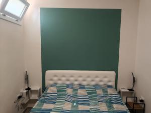 Postel nebo postele na pokoji v ubytování DiVino Appartamenti Vista Mare