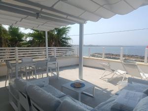 Balkón nebo terasa v ubytování DiVino Appartamenti Vista Mare