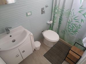 Koupelna v ubytování DiVino Appartamenti Vista Mare