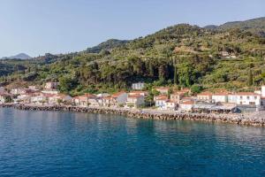 a town on the shore of a body of water at Aelia Summer House in Samos
