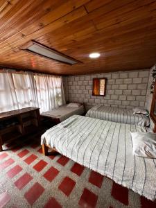 Postel nebo postele na pokoji v ubytování Finca La Toscana
