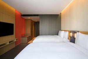 Courtyard by Marriott Suwon客房内的一张或多张床位