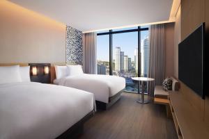 Courtyard by Marriott Suwon客房内的一张或多张床位