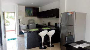 Kuchyň nebo kuchyňský kout v ubytování lujoso apartamento