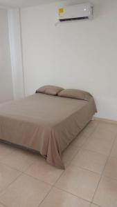 Postel nebo postele na pokoji v ubytování lujoso apartamento + 37 fotografií