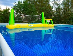 a swimming pool with at Hotel i Restauracja Sara in Polanica-Zdrój