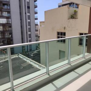 a view of a balcony of a building at Lindo apartamento na Barra in Salvador