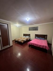 Ein Bett oder Betten in einem Zimmer der Unterkunft Be at home
