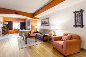 a living room with two chairs and a couch at Chula Vista Condo 2632/2634 in Wisconsin Dells