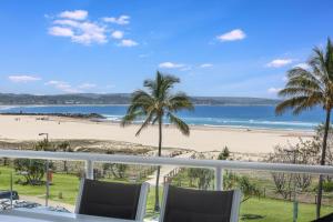 a view of the beach from the balcony of a resort at Sands On Greenmount Unit 4 in Gold Coast