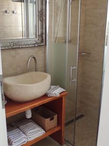 a bathroom with a sink and a shower at Seaside holiday house Cove Tri luke, Korcula - 22092 in Vela Luka