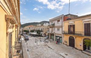 a view of a street in a town with buildings at Stunning Apartment In Chiaramonte Gulfi With Wi-fi in Chiaramonte Gulfi