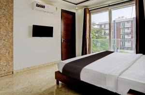 A bed or beds in a room at Collection O Vikrant Residency