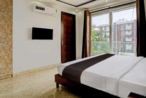 Tempat tidur dalam kamar di Collection O Vikrant Residency