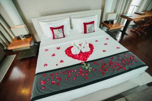 Ein Bett oder Betten in einem Zimmer der Unterkunft Javana Royal Villas
