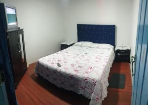 Postel nebo postele na pokoji v ubytování Hostal Perla Del Norte