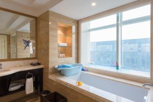Koupelna v ubytování Qingdao Jianxin International Hotel