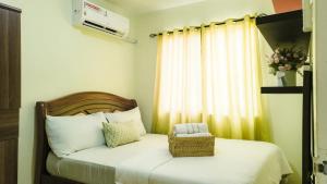 Postel nebo postele na pokoji v ubytování Kara's Suite + 37 fotografií