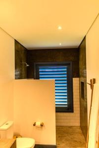 Ein Badezimmer in der Unterkunft Casa de Praia Perfeita