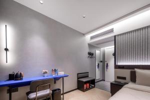 Postel nebo postele na pokoji v ubytování Atour Light Hotel Zhoushan Dinghai South Renmin Road