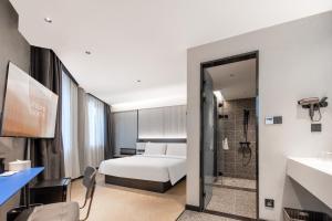 Postel nebo postele na pokoji v ubytování Atour Light Hotel Zhoushan Dinghai South Renmin Road