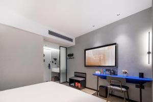Postel nebo postele na pokoji v ubytování Atour Light Hotel Zhoushan Dinghai South Renmin Road