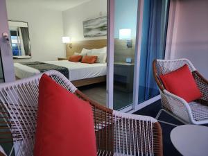 Postel nebo postele na pokoji v ubytování Hotel 39 Jamaica