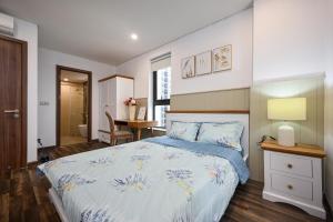 Ένα ή περισσότερα κρεβάτια σε δωμάτιο στο Hà Đô Q10 2PN-3PN 2WC- Khoa Home +291 φωτογραφίες