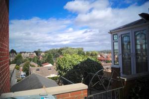 a view of a city from a balcony at 3 Bed House with Exceptional view in Batley