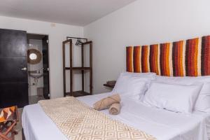 Voodi või voodid majutusasutuse Apartamento Anawasi, Terraza Privada, Camas Queen y Parqueadero toas