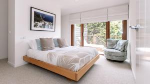 En eller flere senge i et værelse på Bella Vista