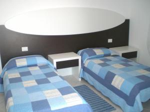 Posteľ alebo postele v izbe v ubytovaní Residence Olbia