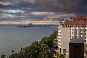 a view of the water from a building at BEST SERVICED APARTMENT IN COCHIN,MARINE DRIVE in Cochin