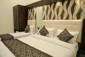 Katil atau katil-katil dalam bilik di Hotel The Savera Park