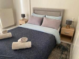 A bed or beds in a room at Guest-home 2