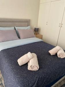 A bed or beds in a room at Guest-home 2