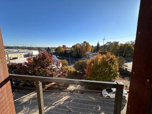 a view of a parking lot from a balcony at Entire 1-Bedroom Apartment In Downtown Portland in Portland