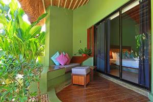 a room with a couch and a bed in a room at Villa Kasadya in Panglao +74 photos