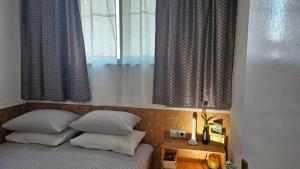 Postel nebo postele na pokoji v ubytování Studio apartman Gradna