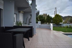 Fotografie z fotogalerie ubytování MG luxury villa kalithies v destinaci Kalithies